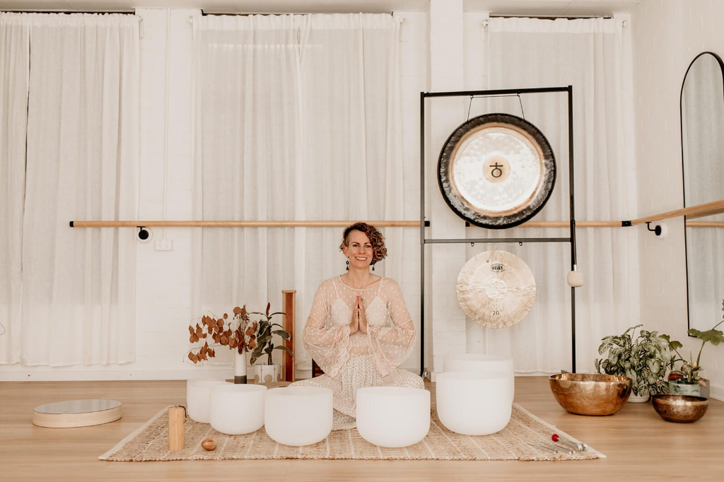A complete studio setup featuring crystal singing bowls, brass bowls, and gongs for deep acoustic relaxation. (Photo: LionHeartCircle)